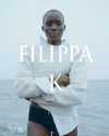 Filippa K story case fashion boy with white shirt in the beach