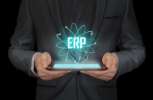Ipad projection ERP letters in the air.